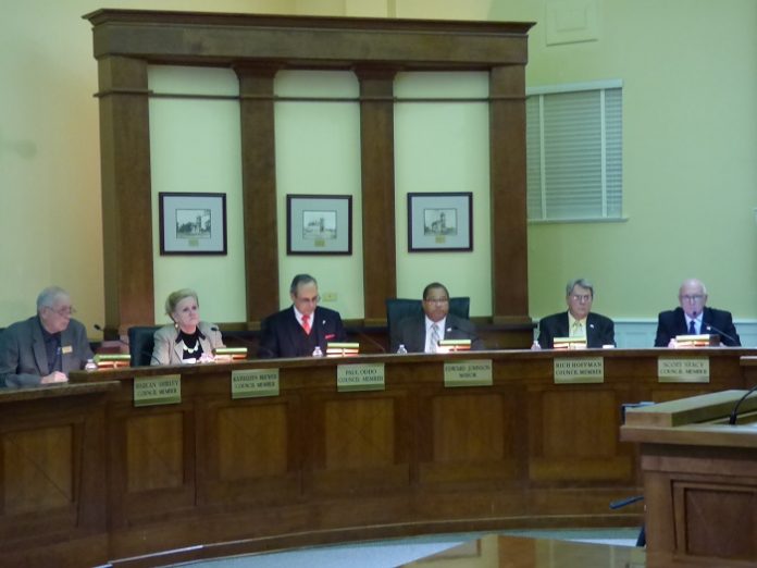 Members of the Fayetteville City Council at the Nov. 7 meeting were, from left, council members Harlan Shirley, Kathaleen Brewer and Paul Oddo, Mayor Ed Johnson and council members Rich Hoffman and Scott Stacy. Photo/Ben Nelms.