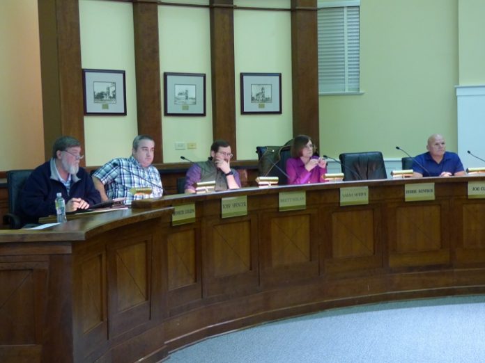 Members of the Fayetteville Planning and Zoning Commission on Nov. 19 recommending approval of a 48-lot subdivision on the city’s south side included, from left, commissioners Ken Collins, Toby Spencer and Brett Nolan, Chairman Sarah Murphy and Commissioner Joe Clark. Photo/Ben Nelms.