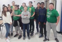The academic team at J.C. Booth Middle show off their trophies after winning the Middle School Academic Bowl with an undefeated season. Photo/Fayette County School System.