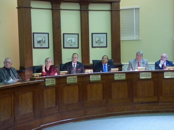 Members of the Fayetteville City Council at the Dec. 5 meeting included, from left, council members Harlan Shirley, Kathaleen Brewer and Paul Oddo, Mayor Ed Johnson and council members Rich Hoffman and Scott Stacy. Photo/Ben Nelms.