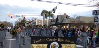 The Fayette County High School Tiger Band was one of the many entries at the Fayetteville Christmas Parade held Dec. 7. Photo/Ben Nelms.