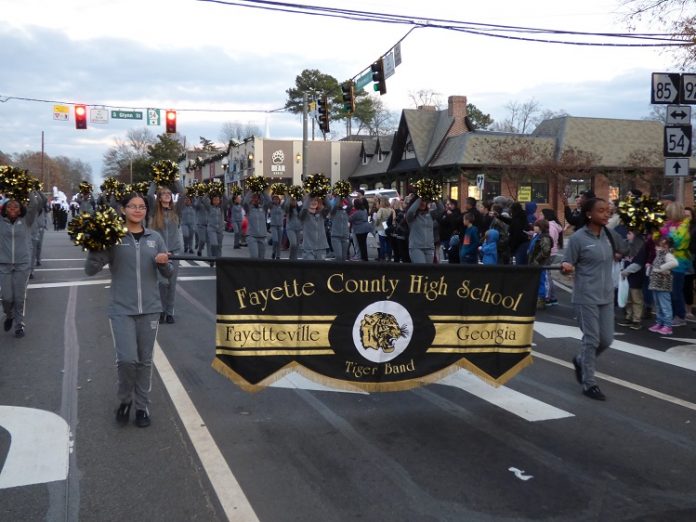 The Fayette County High School Tiger Band was one of the many entries at the Fayetteville Christmas Parade held Dec. 7. Photo/Ben Nelms.