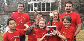 Crabapple Lane Elementary won the grand championship at the FIRST LEGO League Super Regional competition and are heading to the state competition in February. Team members (L-R) Masaya Misugi, Thomas Morrow, Corin Staples, Isabelle Sanchez, Ember Vlachos , and Mark Blahnik. Coaches are Patrick Staples and Jaime Sanchez. Photo/Fayette County School System.