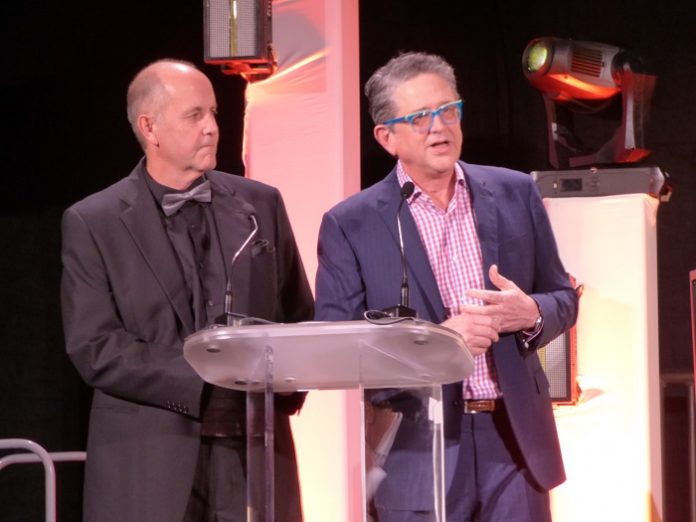 Pinewood Forest President Rob Parker, at left, and Pinewood Atlanta Studios President Frank Patterson kicked-off the events at the annual Reel People Care nonprofit fundraiser held Jan. 11 in Soundstage 16. Photo/Ben Nelms.