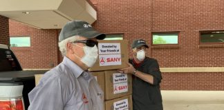 SANY team members Tom Cooper and Rob Nelson delivered masks to Piedmont-Fayette Hospital in Fayetteville, Ga. Photo/SANY America.