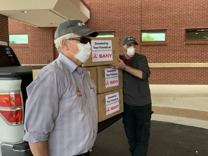 SANY team members Tom Cooper and Rob Nelson delivered masks to Piedmont-Fayette Hospital in Fayetteville, Ga. Photo/SANY America.