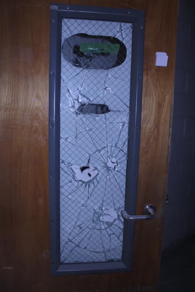 Shattered classroom doors were part of the damage done by vandals at Oak Grove Elementary School in Peachtree City on May 19. Prior damage on May 14 and 15 totaled $13,000. Photo/Peachtree City Police Department.