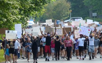 A group of 400 people protesting the loss of black lives to law enforcement marched along Ga. Highway 54 in Peachtree City during the afternoon hours of June. 2. The peaceful protest began at The Avenue and ended at City Hall Plaza. Photo/Ben Nelms.