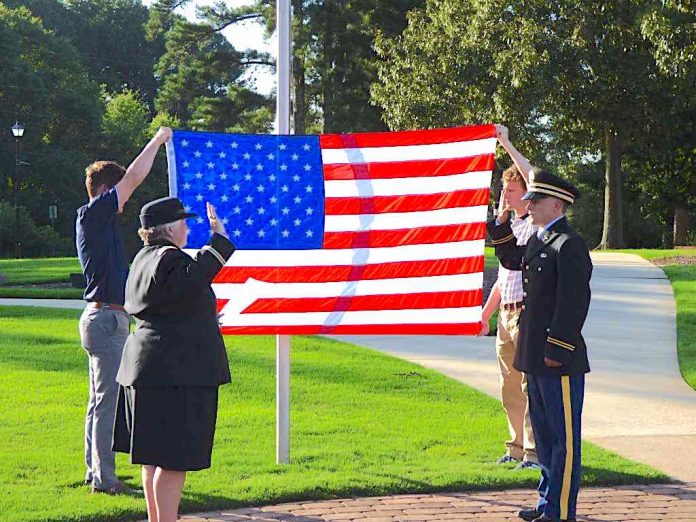 Nearly 100 people turned out July 10 to see Tyrone resident Connor Dial sworn-in as a 2nd Lieutenant by Lt. Col. Sharon Collins (Ret.) in an unofficial ceremony in Shamrock Park. Photo/Ben Nelms.