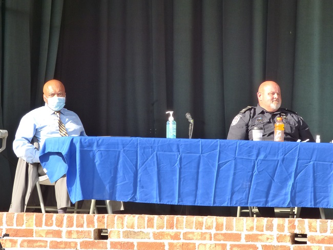 <b>Civil rights attorney Wayne Kendall (L) and Fayetteville Police Chief Scott Gray were part of a panel about racial matters and policing. Photo/Ben Nelms.</b>