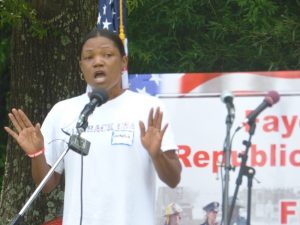 <b>Loganville talk show host Lucretia Hughes Klucken was one of the many speakers Aug. 1 at the All-American Rally for Trump at the Fayette County GOP Event Center in Fayetteville. Photo/Ben Nelms.</b>