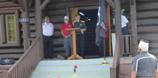 A group of veterans from around Fayette County met Sept. 18 at the American Legion Log Cabin in Fayetteville for the annual POW/MIA Recognition Day, in the hope that people of this nation will "Never Forget" the service and sacrifice of those who never retuned home. Photo/Ben Nelms.