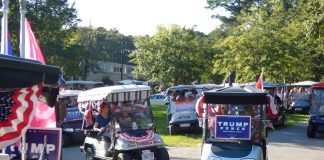 Nearly 50 golf carts filled with enthusiastic Donald Trump supporters held the Trumptilla Golf Cart Parade on Sept. 5, prior to Peachtree City's annual fireworks display, which had been postponed from July 4. Photo/Ben Nelms.