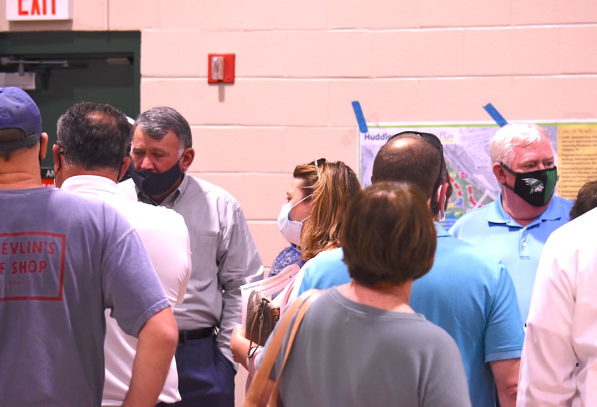 <b>Councilmen Mike King (L) and Terry Ernst (both facing camera) hear from residents Oct. 22. Photo/Cal Beverly.</b>