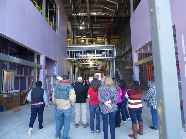 Fayetteville municipal employees and others on Oct. 2 got a look at the new City Hall under construction on Stonewall Avenue. The view is from the front door of the building, looking down large grand lobby of the 34,000 sq. ft. building. Photo/Ben Nelms.