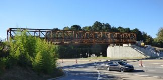 The new gateway bridge on Ga. Highway 54 West in Peachtree City was in place Saturday afternoon. Multi-use paths will be added on both sides of the highway. Photo/Ben Nelms.