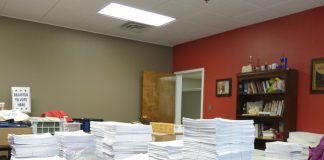 The Nov. 3 election in Fayette County will likely be historic in terms of voter turn-out. The stacks of ballots cast in-person, shown above, are but a small percentage of the total of 59,549 absentee in-person, absentee by mail and electronic ballots cast by 2 p.m. on Oct. 31. Photo/Ben Nelms.