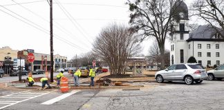 Work has begun to create more parking in the area of the old county courthouse on the square in Fayetteville. Photo/City of Fayetteville.