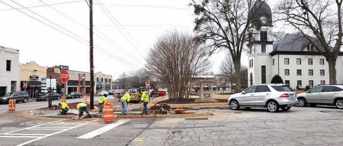 Work has begun to create more parking in the area of the old county courthouse on the square in Fayetteville. Photo/City of Fayetteville.