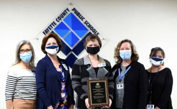 Benefits staff of the human resources department proudly display the Best in Class platinum award the department received for the school system’s flexible benefits program, TOTAL Rewards. (L-R) Ronda English, Renee Hammer, Melanie Griffin, Erin Roberson, and Marie Eargle. Photo/Submitted.
