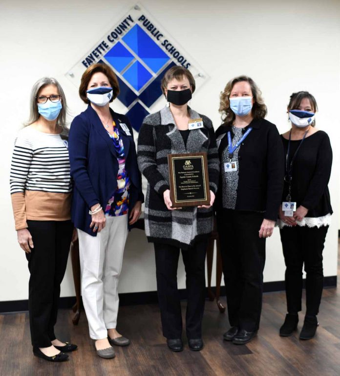 Benefits staff of the human resources department proudly display the Best in Class platinum award the department received for the school system’s flexible benefits program, TOTAL Rewards. (L-R) Ronda English, Renee Hammer, Melanie Griffin, Erin Roberson, and Marie Eargle. Photo/Submitted.