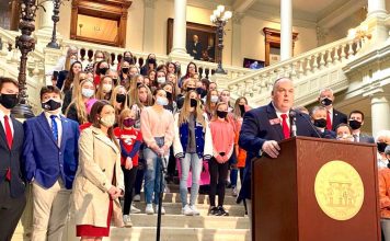 Dozens of student athletes in Georgia girls’ sports joined state Rep. Phillip Singleton (at podium) to support his bill banning transgender participation on Feb. 4, 2021. Photo/Beau Evans of Capitol Beat.