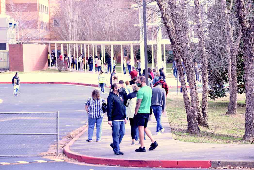 <b>Fayette School System employees lined up at 9 a.m. March 11 to await their Covid-19 initial doses. Second doses will be given in April. Photo/Cal Beverly.</b>