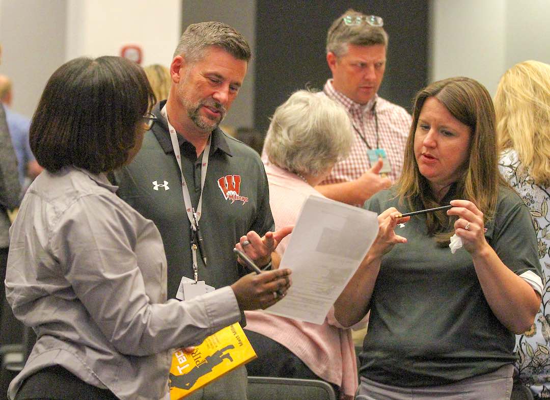 <b>Teams competed in a quiz that focused on the history of the school system and county itself. Photo/Chris Dunn.</b>