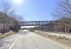 Google Street View of cart path bridge across Ga. Highway 74, looking south.