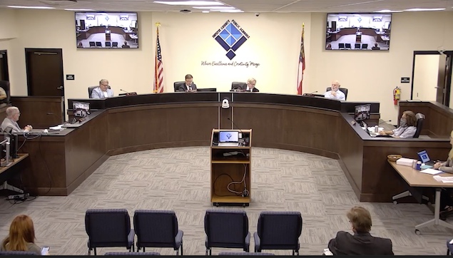 Fayette County Board of Education at July 26 meeting. (L-R) At dais, Randy Hough, Brian Anderson, Superintendent Dr. Jonathan S. Patterson, Chairman Scott Hollowell, Roy Rabold and Leonard Presberg. Photo from BoE website.