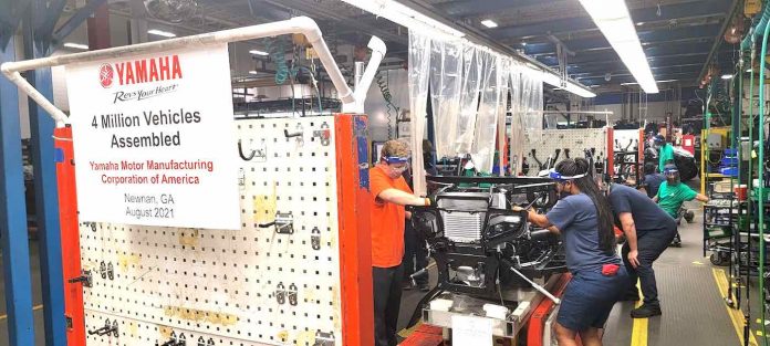Assemblers put the finishing touches on the 4 millionth vehicle to come off the line at the Yamaha plant in Newnan. Photo/Submitted.