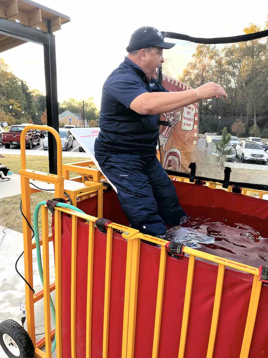 Fayetteville leaders take a cold dunk at Carnival in the Park The Citizen