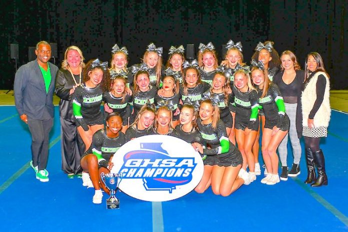 McIntosh High School cheerleaders and coaches celebrate third state title in a row. Photo/Fayette County School System.