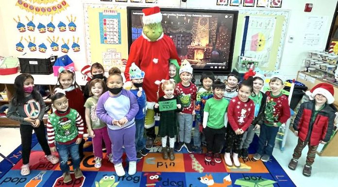 Meredith Mazzillo’s kindergarteners at Huddleston decoded clues to find where the Grinch had hidden their class Christmas tree. Photo/Fayette County School System.