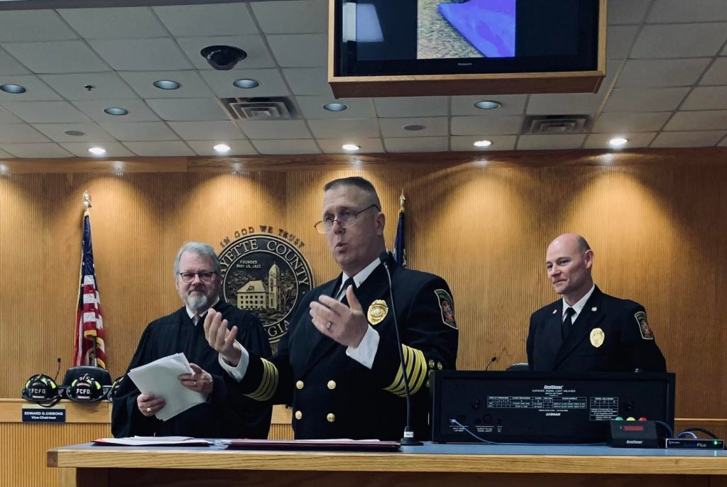 Assistant Fire Chief Steven Folden makes keynote remarks with Judge Fletcher Sams and Fire Chief Jeff Hill. Photo/Bonnie Kay Douglas.