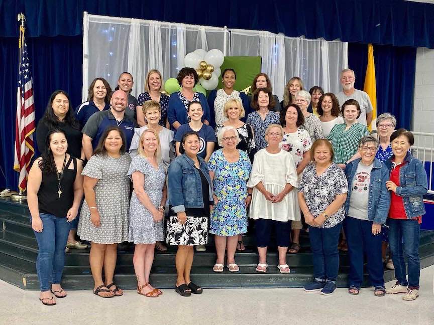 Current and former staff members of Our Lady of Victory School in Tyrone gather for the closing ceremony. Photo/Submitted.