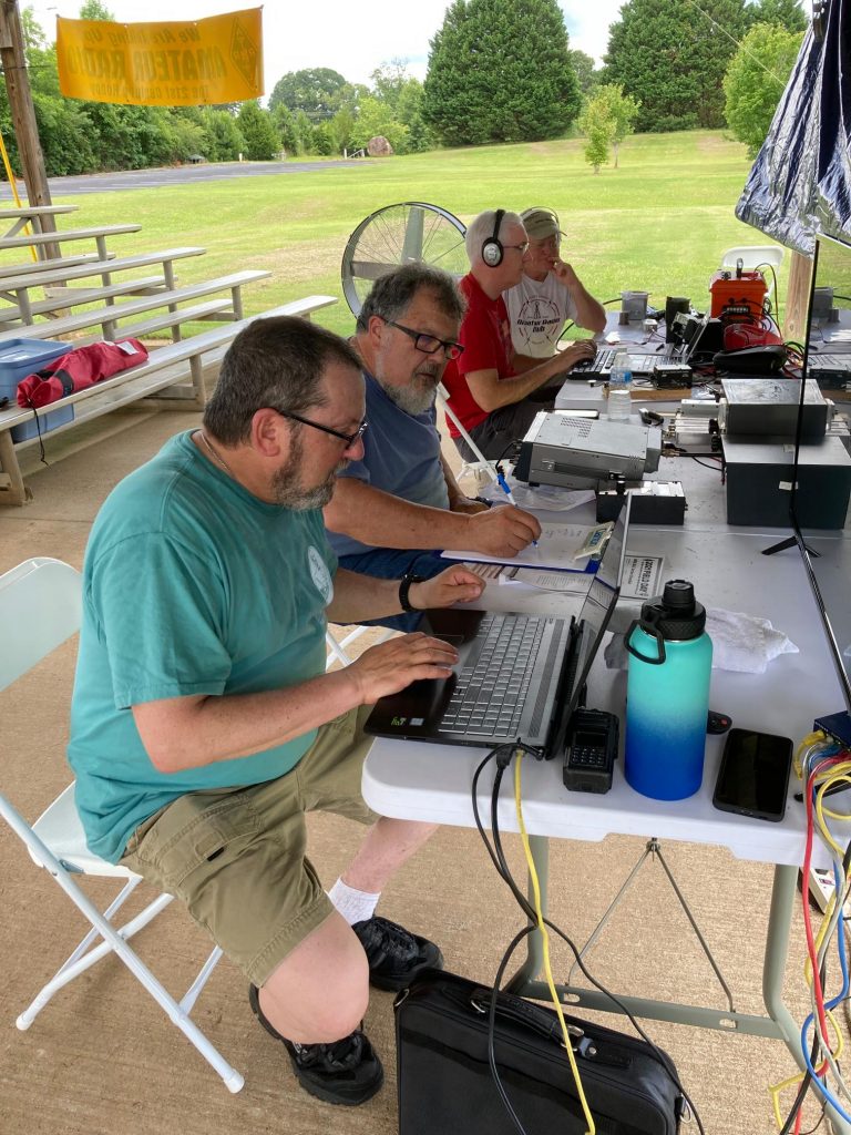 FCARC members David Salomon (AG4F) and Ross Pryor (AJ4P) work the radio station during the 2021 Field Day.