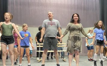 Cast members of "Mary Poppins" at Southside Theatre Guild rehearse a group scene for the upcoming play. Photo/Submitted.