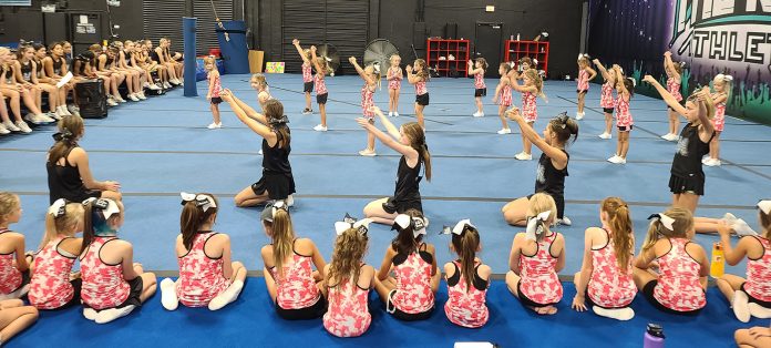McIntosh High cheerleaders mentored Fayette County Community Youth Football and Cheerleading program participants on cheer routines, tumbling, stunting, and choreography. Photo/Fayette County School System.