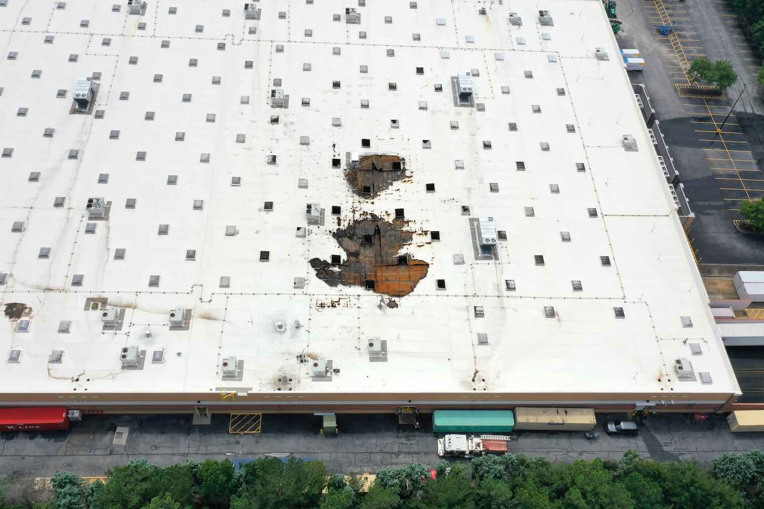 A drone view of the holes in the Walmart roof shows where a fire burned through roof struts, causing the roof to collapse. Drone photo provided by Bob Ross.