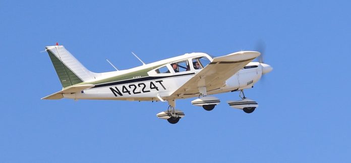 Volunteer pilot takes a family up for a flight from Falcon Field in the Challenge Air event. Photo/Submitted.