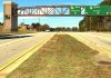 A potential bridge design is superimposed on a view of Ga. Highway 74 North looking northward toward the Hwy. 54-74 intersection.