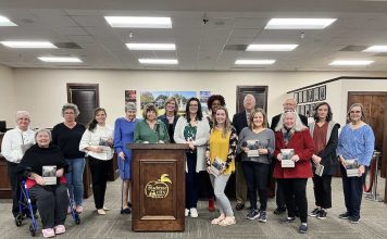 Authors, poets and contributors to the Peachtree City Library anthology ”Hip Pocket” pose for a group photo at the March 16, 2023 Peachtree City Council meeting. Photo/Submitted.