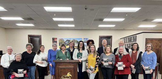 Authors, poets and contributors to the Peachtree City Library anthology ”Hip Pocket” pose for a group photo at the March 16, 2023 Peachtree City Council meeting. Photo/Submitted.