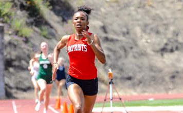 Sandy Creek High School senior Isis Simone Grant on her record-setting pace to become the fastest 800-meter female runner in the history of Georgia track records. Photos/Atlanta Track Club.