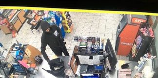 Robber holds up convenience store clerk. Photo/Peachtree City Police