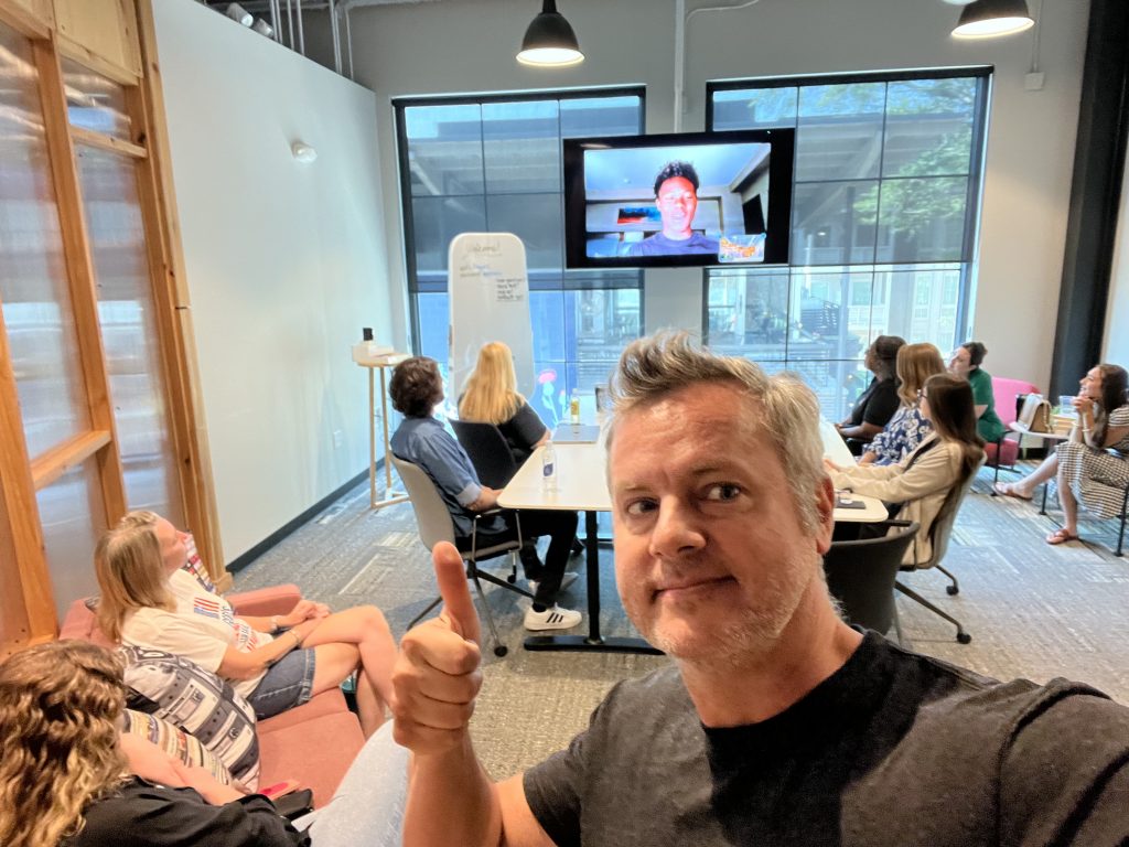 All hands on deck! July 2023 team meeting featuring in-person and remote staff. Photo/Joe Domaleski