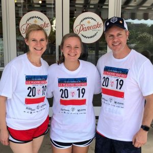 Mary Catherine, Alex, and Joe Domaleski wearing their Peachtree finisher shirts from 2019. Photo/Joe Domaleski