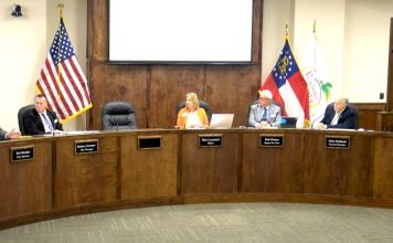 Peachtree City Attorney Ted Meeker (L) explains a point of law to City Manager Bob Curnow, Mayor Kim Learnard, and council members Phil Prebor, Clint Holland and Frank Destadio. Photo/from video of council meeting.