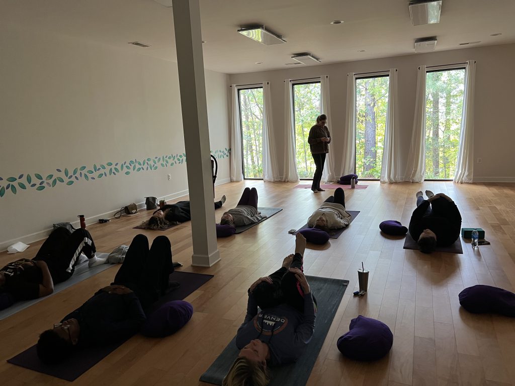 The Country Fried Creative team enjoys a class at Sweet Tea Yoga in Peachtree City. Instructor Tanya Dunne leads the class. Photo/Christina Colantonio